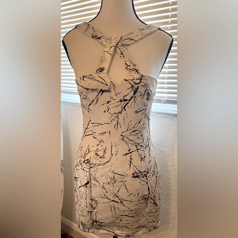 Designer white sheath cocktail dress size 6 by Gomez Gracia